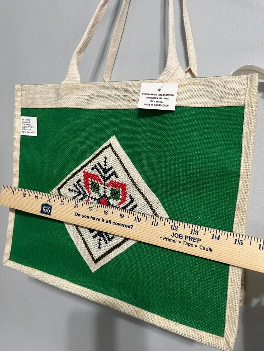 Boho-Chic Natural Jute Handbag with Cross-Stitch Embroidery.